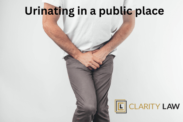 Urinating in a public place